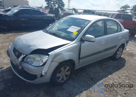 2009 Kia Rio Lx z USA, uszkodzony, nr VIN KNADE223296459124
